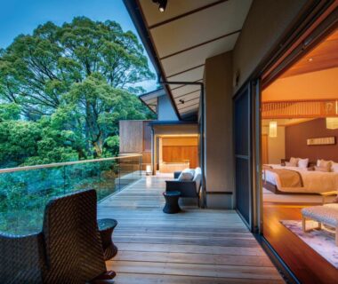 Wooden balcony with chairs and sliding doors at ABBA Resorts Izu Zagyosoh in Shizuoka, Chubu, Japan