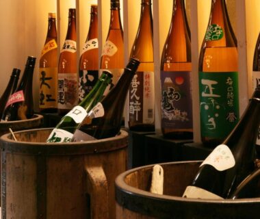 Sake bottles chilled in wooden barrels at AWA Nishi-Izu, Shizuoka, Chūbu, Japan