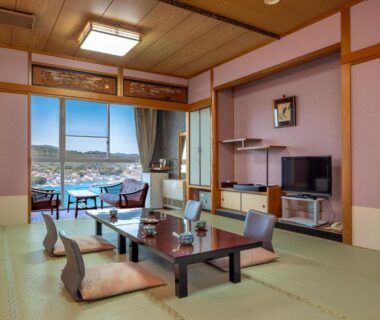 Tatami room with low table and cushions, Ama no Shima overlooking bay in Mie, Kansai