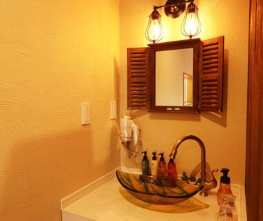Glass vessel sink with wooden shutter mirror at Amis Droles, Shizuoka, Chūbu