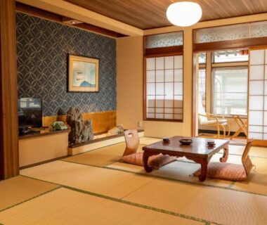 Tatami room with low table, zabuton cushions and shoji screens at Andaikan, Nagano, Chubu, Japan