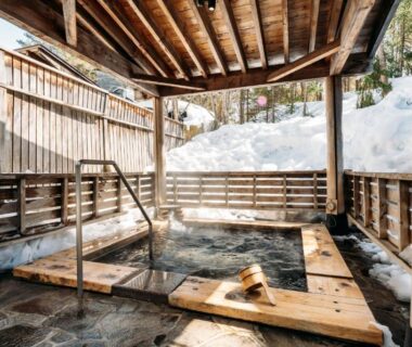 Wooden outdoor onsen bath with snow at Appikogen Mori no Hotel in Iwate