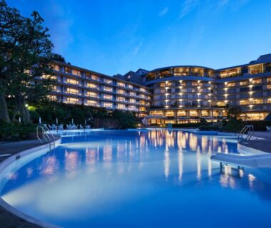 Night pool with illuminated water and hotel facade at Arima Grand Hotel in Hyōgo, Kansai
