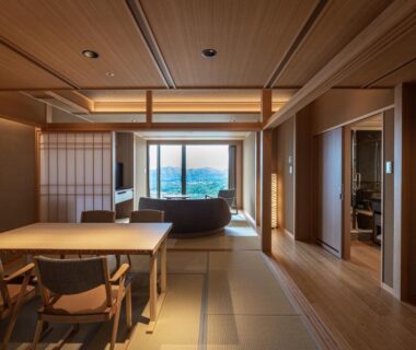 Tatami room with low table, shoji screens and window seating at Arima Grand Hotel, Hyōgo, Kansai