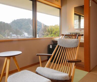 Wooden lounge chair and table in tatami room at Arima Hot Spring Ryokan Kotori, Hyōgo, Kansai