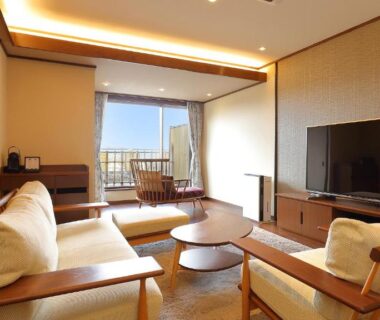 Sofa seating and balcony in Arima Onsen Taketoritei Maruyama living area, Hyōgo, Japan