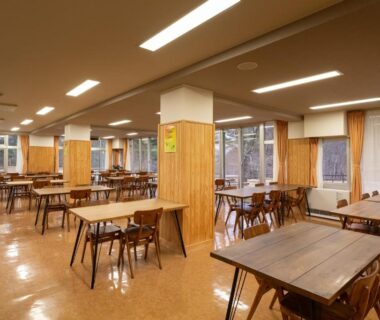 Wooden tables and chairs in dining hall at Ashionoyado Kajika, Tochigi, Kantō, Japan