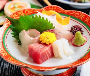 Sashimi selection with shiso leaf, wasabi and chrysanthemum at AsoTsuruya in Kumamoto, Kyushu