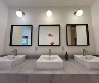 Three vessel sinks and mirrors at Assi House, Ōita, Kyūshū
