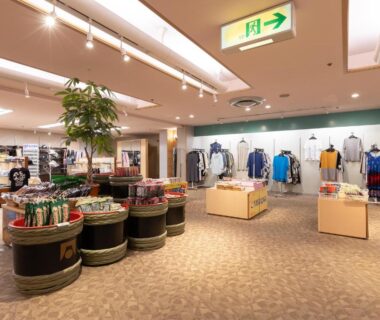 Retail area with clothing and souvenir displays inside Atami New Fujiya Hotel in Shizuoka, Chūbu, Japan