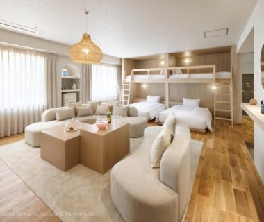 Light-filled modern room with bunk beds, twin beds and seating at Atarayo Nishiizu Onsen, Shizuoka