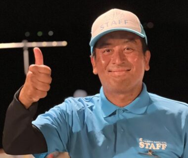 Ryokan staff member in uniform giving thumbs up at Awakan in Hyōgo, Kansai