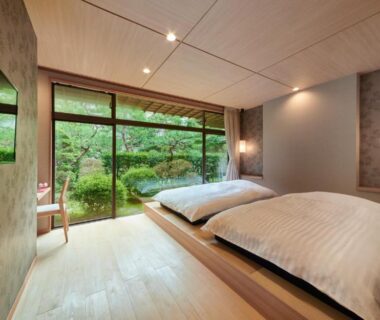 Tatami room with futon beds and garden view, Awazuonsen Kitahachi, Chūbu, Ishikawa, Japan