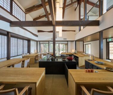 Open wooden counter seating with exposed beams and shoji screens at Azumi Setoda, Hiroshima, Japan