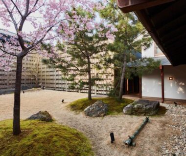 Gravel courtyard with moss islands and small trees at Azumi Setoda, Hiroshima