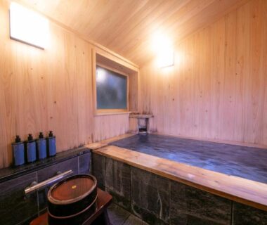 Indoor wooden onsen bath at Baien ryokan, Ōita, Kyūshū, Japan