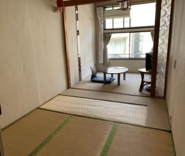 Traditional tatami room with low table and cushions at Beppu no Oyado Kagaya, Ōita, Kyūshū