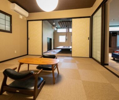 Traditional tatami room with low table and sliding doors at Bettei Fujiya, Hiroshima