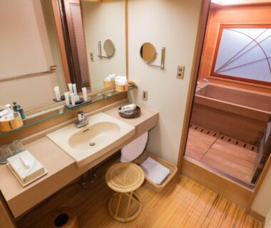 Sink vanity and stool leading to wooden soaking tub, Bousui ryokan, Shizuoka Chubu