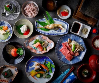 Assorted traditional Japanese dishes and bowls at Busuitei ryokan, Chūbu Gifu Japan