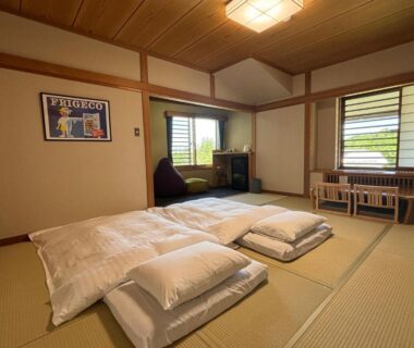 Tatami room with futons and low seating at Club Wyndham Shirakabaso Shigakogen, Nagano