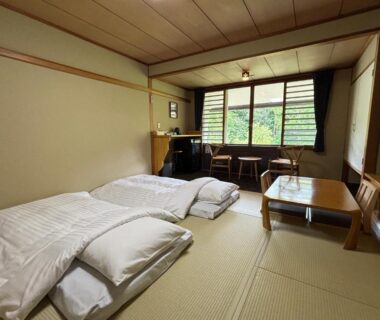 Tatami floor room with two futons and low table at Club Wyndham Shirakabaso Shigakogen Nagano