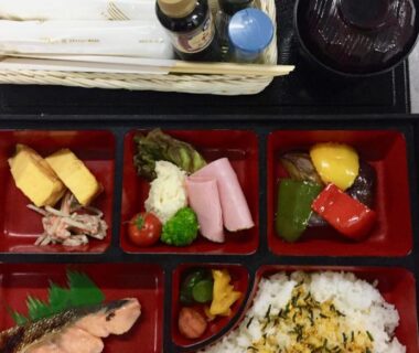 Assorted bento meal with rice, grilled fish, pickles and soup at Daymaruya Ryokan in Nagano