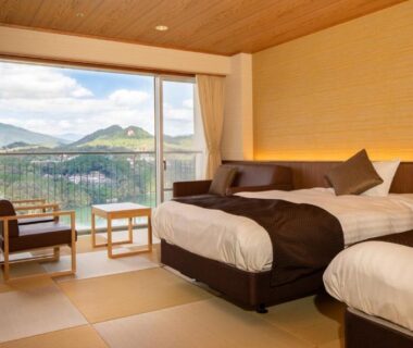 Tatami-style room with twin beds and balcony overlooking mountains, Enakyo Onsen Hotel Yuzuriha, Gifu