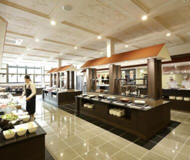 Spacious buffet dining area with staff arranging dishes at Fujikawaguchiko Onsen Konanso, Yamanashi, Chūbu Japan