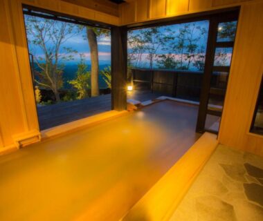Indoor wooden onsen tub with large windows, Gekkoju Kurokawa, Kumamoto, Kyūshū