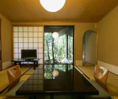 Tatami room with low lacquer table and shoji screens at Gion Yoshiima Kyoto Kansai Japan