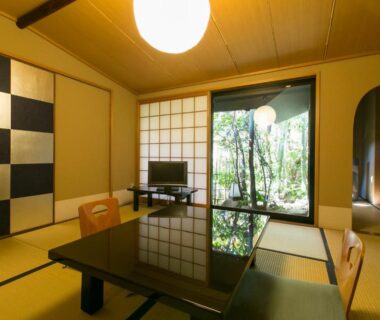 Tatami room with low lacquer table, zaisu chairs and shoji screens at Gion Yoshiima Kyoto