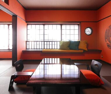 Traditional tatami room with low table, zabuton cushions and shoji window bench at Goyokan, Shizuoka, Chūbu Japan
