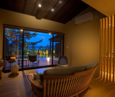 Interior lounge with sofa, wooden partition and terrace at HOSHINO-OTO Kyoto