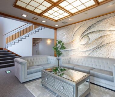 Tufted lounge seating and mosaic wall at Hakone Ashinoko Bikeikan, Kanagawa, Japan
