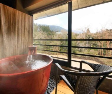 Steaming wooden onsen tub on balcony overlooking forest, Hakone Fuga Adult Only, Kanagawa Japan