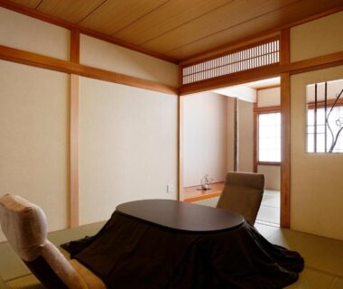 Traditional tatami room with low kotatsu table and floor chairs at Hakone Fura in Kanagawa, Kantō Japan