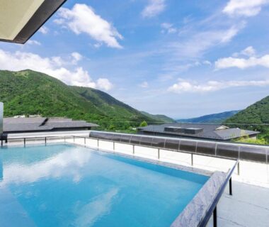 Rooftop pool with glass railing and mountain coastal view at Hakone Gora KARAKU Kanagawa Japan