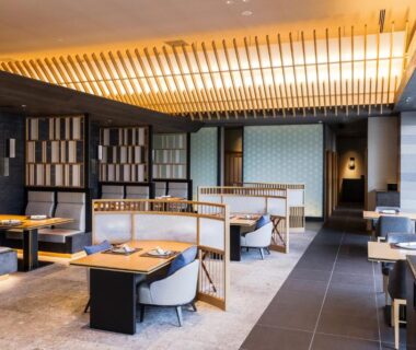 Spacious dining room with partitioned seating and wooden ceiling lighting at Hakone Gora KARAKU, Kanagawa