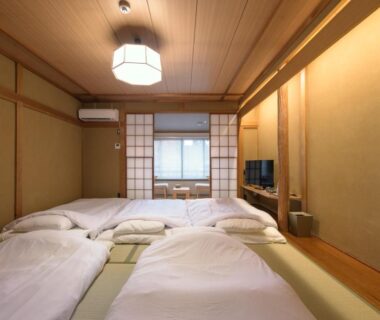 Multiple futon beds on tatami with shoji screens at Hakone Gora Ten, Kanagawa