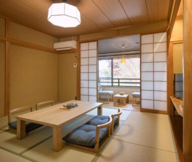 Tatami room with low table, floor cushions, shoji screens and balcony seating at Hakone Gora Ten, Kanagawa