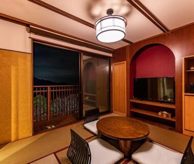 Tatami room with round table, floor chairs and balcony at Hakone Kyuan, Kanagawa, Japan