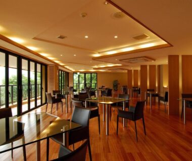 Spacious dining room with wooden floors and large windows at Hakone Tokinoshizuku, Kanagawa