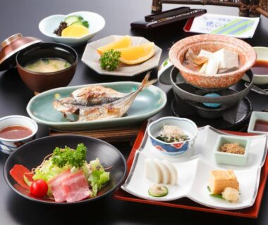 Assorted Japanese dinner dishes arranged at Hakone Yumoto Onsen Hotel Kajikaso, Kanagawa, Japan