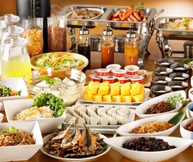 Assorted buffet dishes with salads, juices, desserts and grilled fish at Hakonenomori Okada, Kanagawa