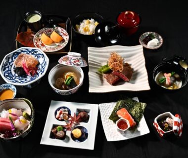Assorted traditional Japanese dishes and bowls arranged for a multi-course ryokan meal at Haku Fuji Yamanakako Yamanashi