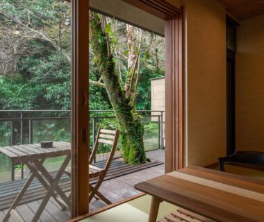 Tatami room with wooden deck and riverside view at Hakuunsou, Kanagawa