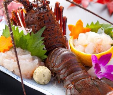 Spiny lobster sashimi on decorative plate with garnishes, served at Hamazen Ryokan in Kumamoto, Kyūshū