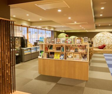 Souvenir shelves and seating area at Hana Beppu lobby in Ōita, Kyūshū, Japan