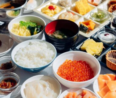 Traditional Japanese breakfast with rice, ikura and assorted side dishes at Hanabishi Hotel Hokkaidō